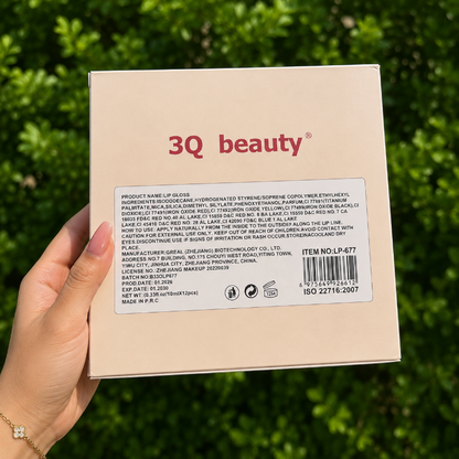 3Q beauty product packaging held by a hand with a green leafy background