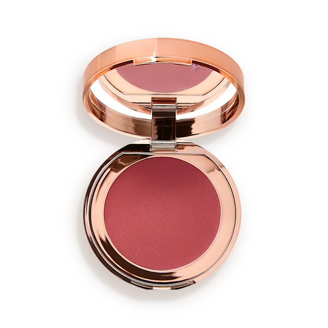 Compact blush with rose gold casing on a white background