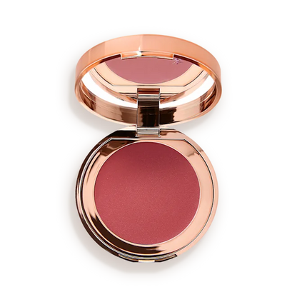 Compact blush with rose gold casing on a white background
