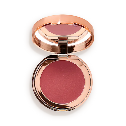 Compact blush with rose gold casing on a white background