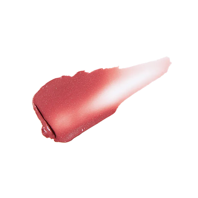 Lip balm stick with a pinkish-red color on a white background