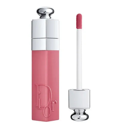 Lip gloss with silver cap and pink body on a white background
