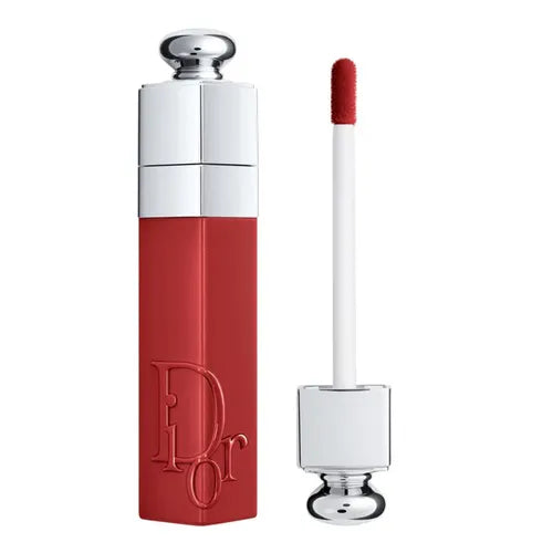 Red Dior lip gloss with silver cap on a white background