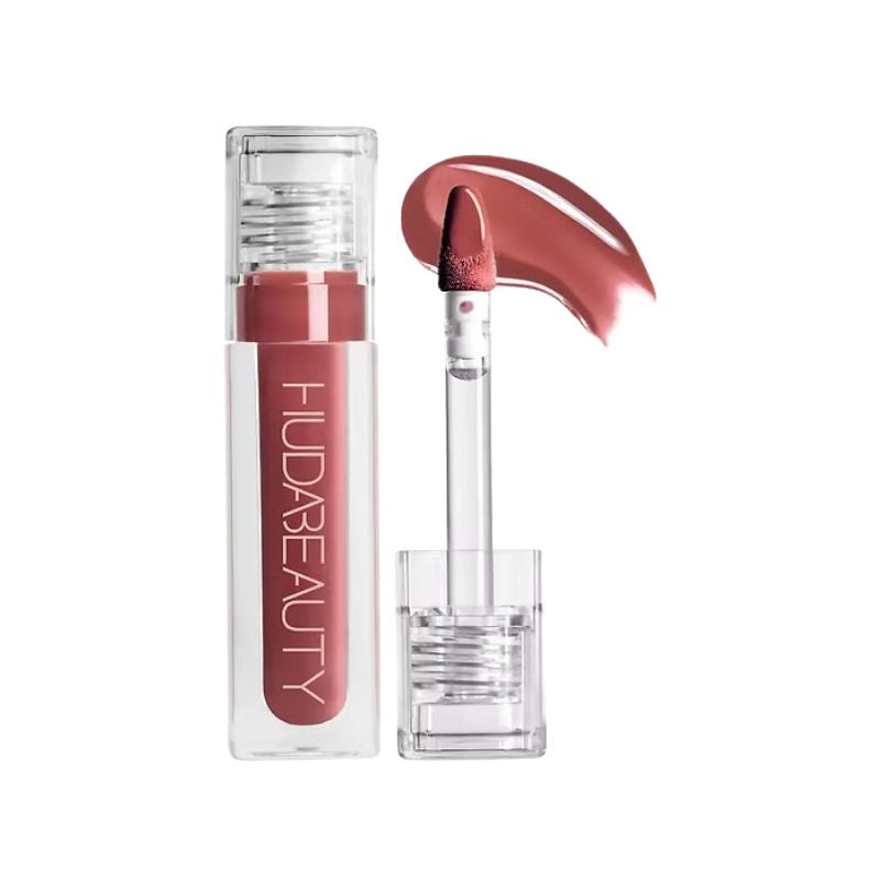 Lipstick with clear casing and visible brand name on a white background