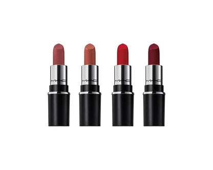 Four MAC lipsticks in different shades on a white background