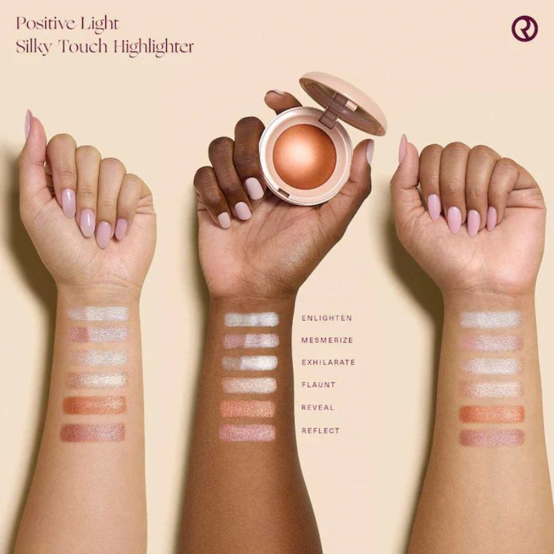 Silky Touch Highlighter with swatches on hands against a beige background