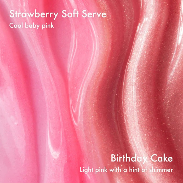 Close-up of pink strawberry soft serve ice cream with 'Birthday Cake' flavor text.