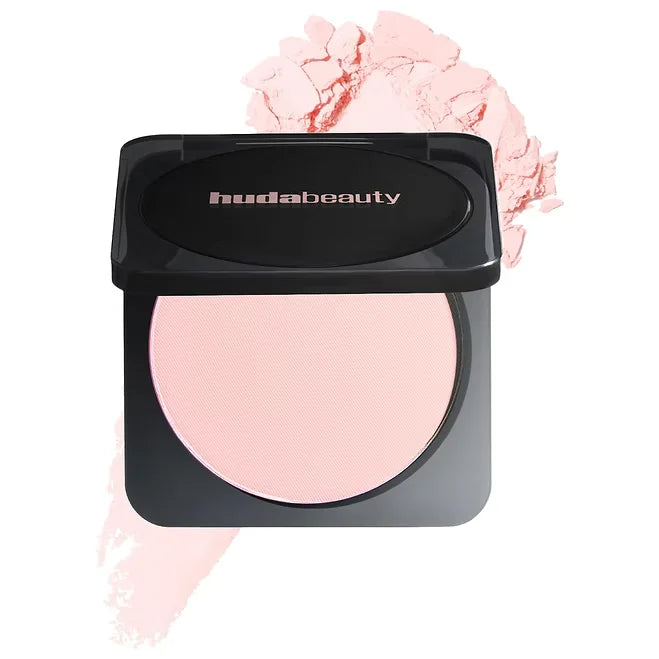 Huda Beauty blush compact with pink blush and open case on a white background