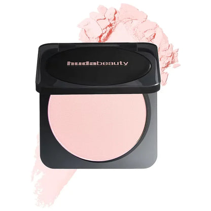 Huda Beauty blush compact with pink blush and open case on a white background